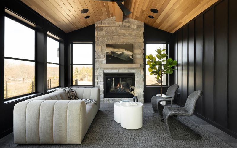 family room with white couch and TV